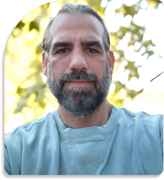 Professional headshot of Tony Nichols, Co-Owner of Hope Centered Wellness Group, specializing in trauma counseling and holistic mental health services.